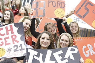 Photo of students at a basketball game. Link to Gifts by Will.