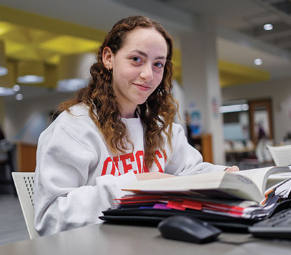 A student smiling