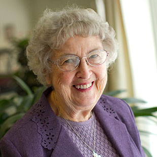 Photo of Enid Carter. Link to her story.